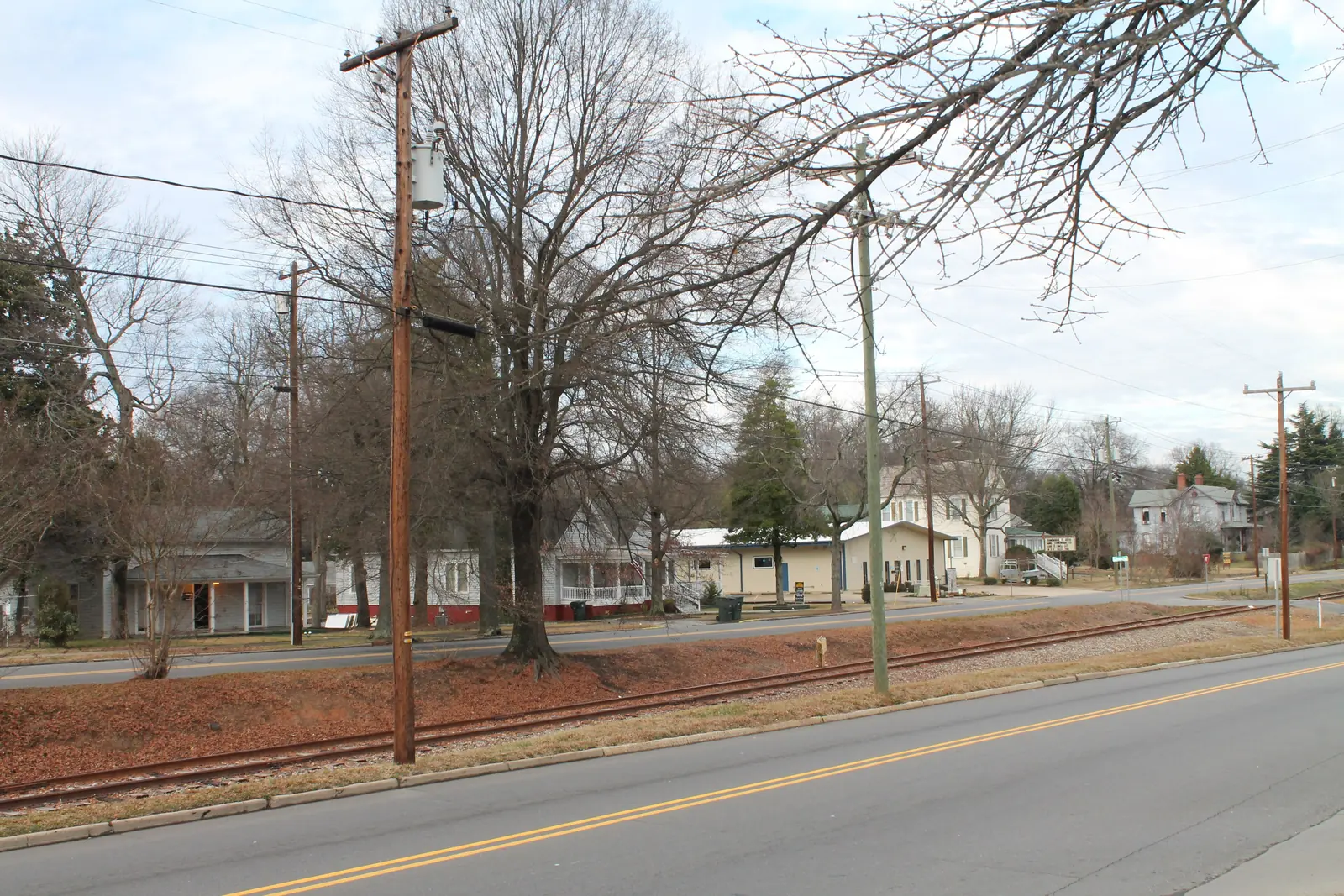 Houses along South Broad Street beside the railroad, inside the Mooresville Historic District
