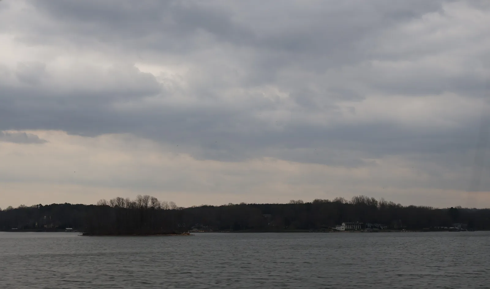 Homes along the far shore of Lake Norman, seen from Cornelius Road in Iredell County