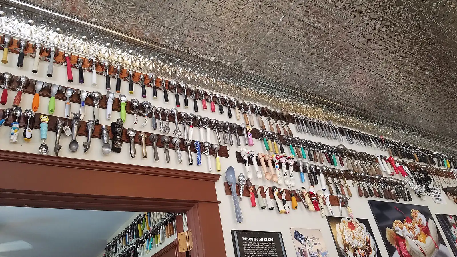 Rows of ice cream scoops on the wall of a soda shop in Old Town Slidell, La. The photo was not taken in Mooresville.