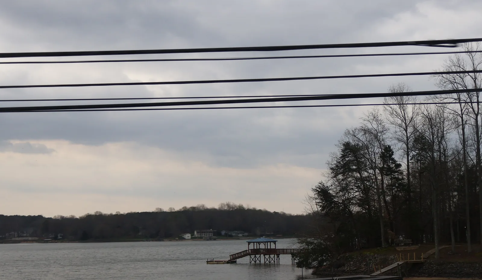 Lake Norman's wooded shoreline, seen from Cornelius Road in Iredell County