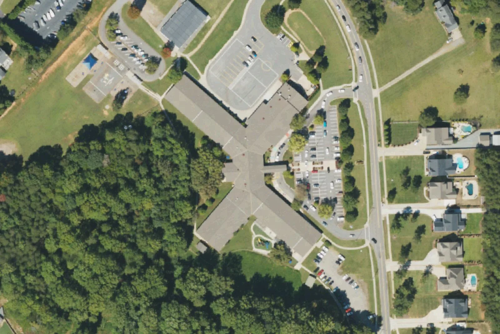 Lake Norman Elementary School's classroom wings and parking lots on Oak Tree Road in Mooresville, seen from the air