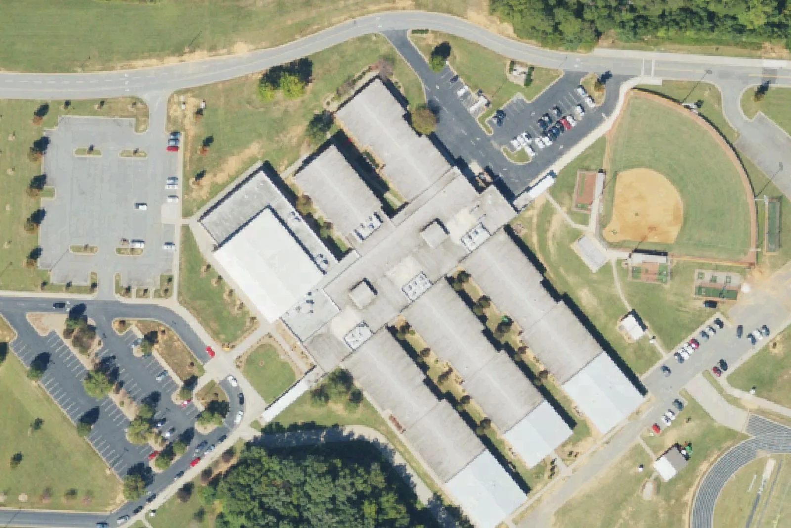 Mooresville Middle School's classroom wings, ball field and parking lots on Kistler Farm Road in Mooresville, seen from the air