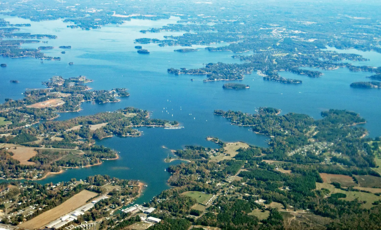 Coves and wooded shoreline of Lake Norman seen from the air