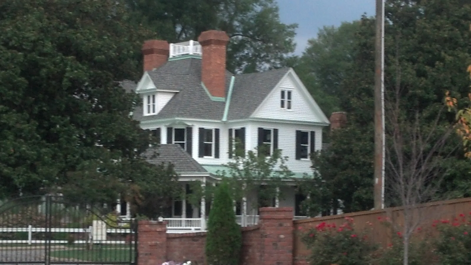 The Espy Watts Brawley House, a historic home with a wide front porch in Mooresville