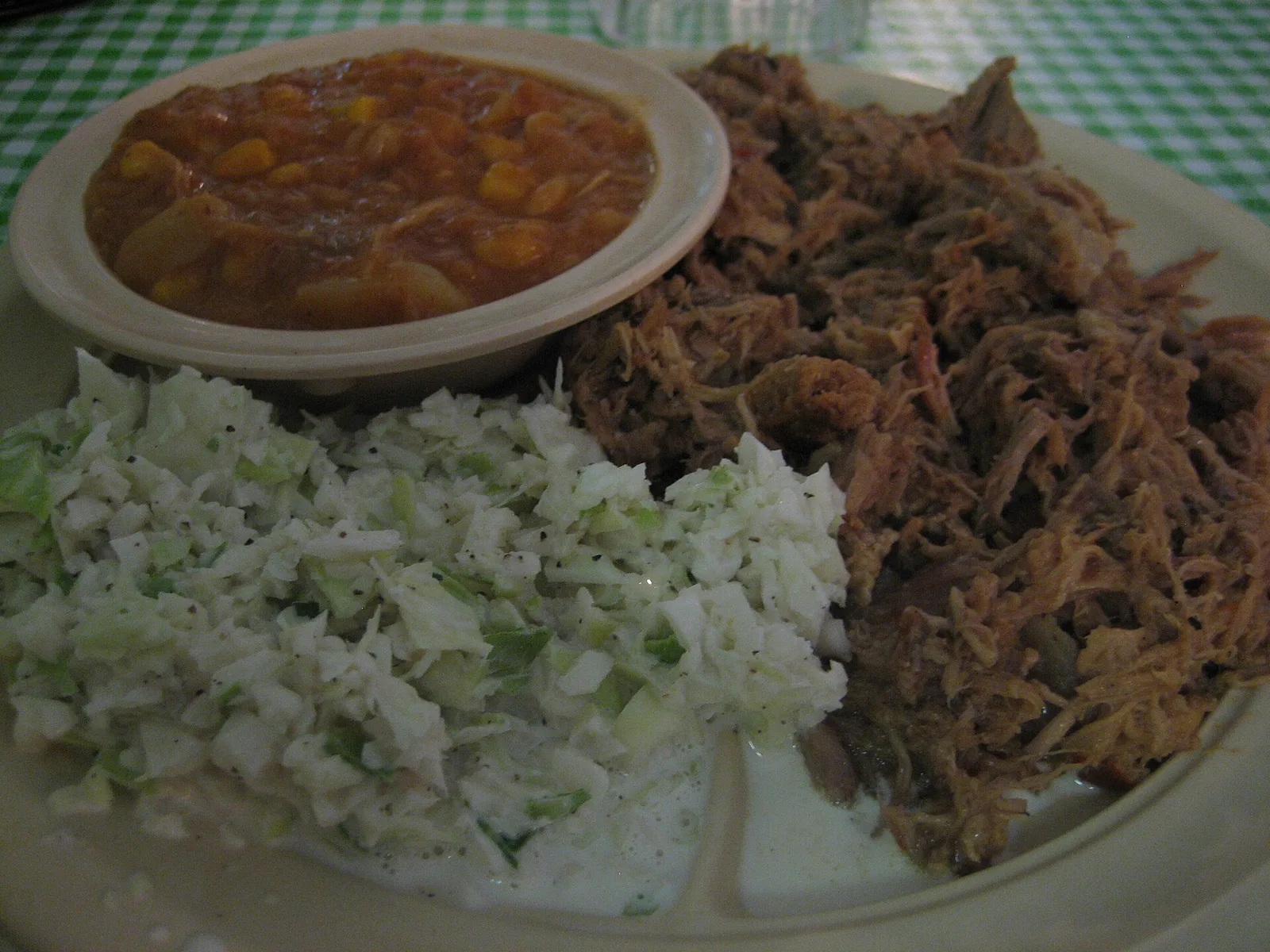 A North Carolina barbecue plate of chopped pork, coleslaw and Brunswick stew. The photo was not taken in Mooresville.